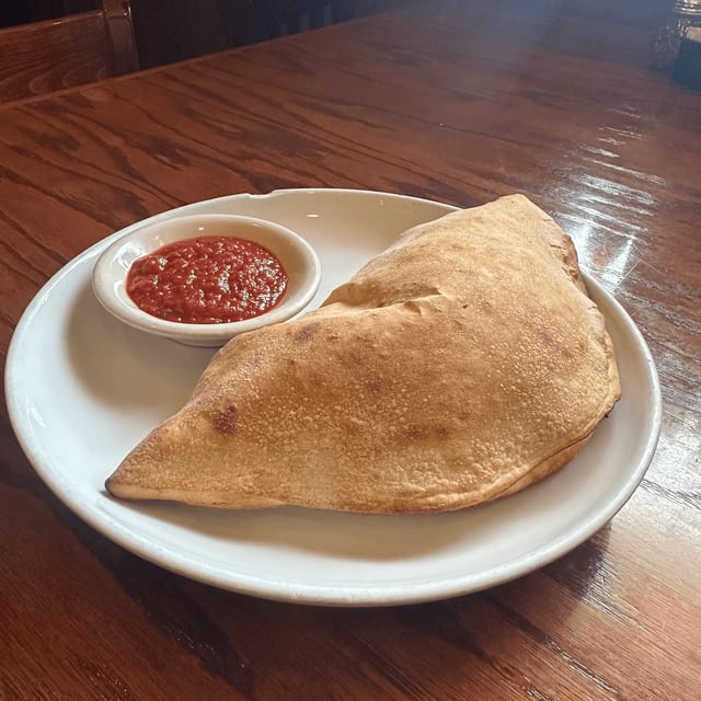 Cheese Calzone with One Topping.